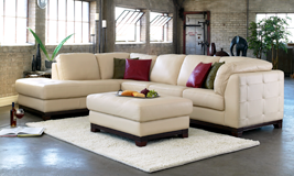 A white leather sectional sofa