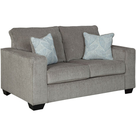 Gray loveseat with throw pillows