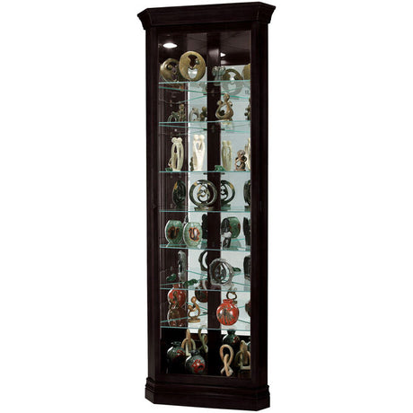 Tall curio cabinet full of decorative plates