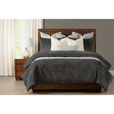 Bed with dark gray duvet cover