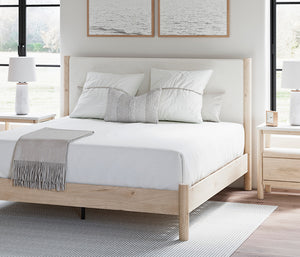 Cadmori Upholstered Panel Bed with pillows and sheets