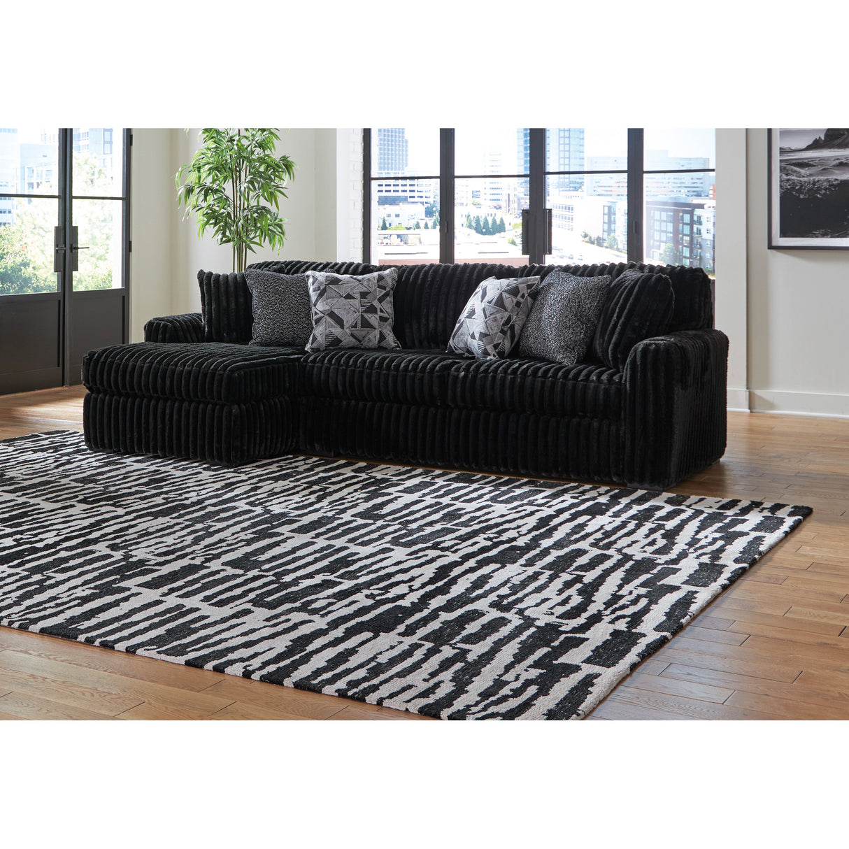 Midnight Madness 2 Piece Left Chaise Sectional with black and white rug