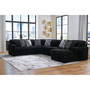 Midnight Madness 4 Piece Right Chaise Sectional in room alone