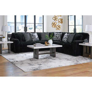 Midnight Madness 3 Piece Sectional in living room with coffee table