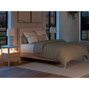 Cadmori 4 Piece Upholstered Room Group at night in bedroom